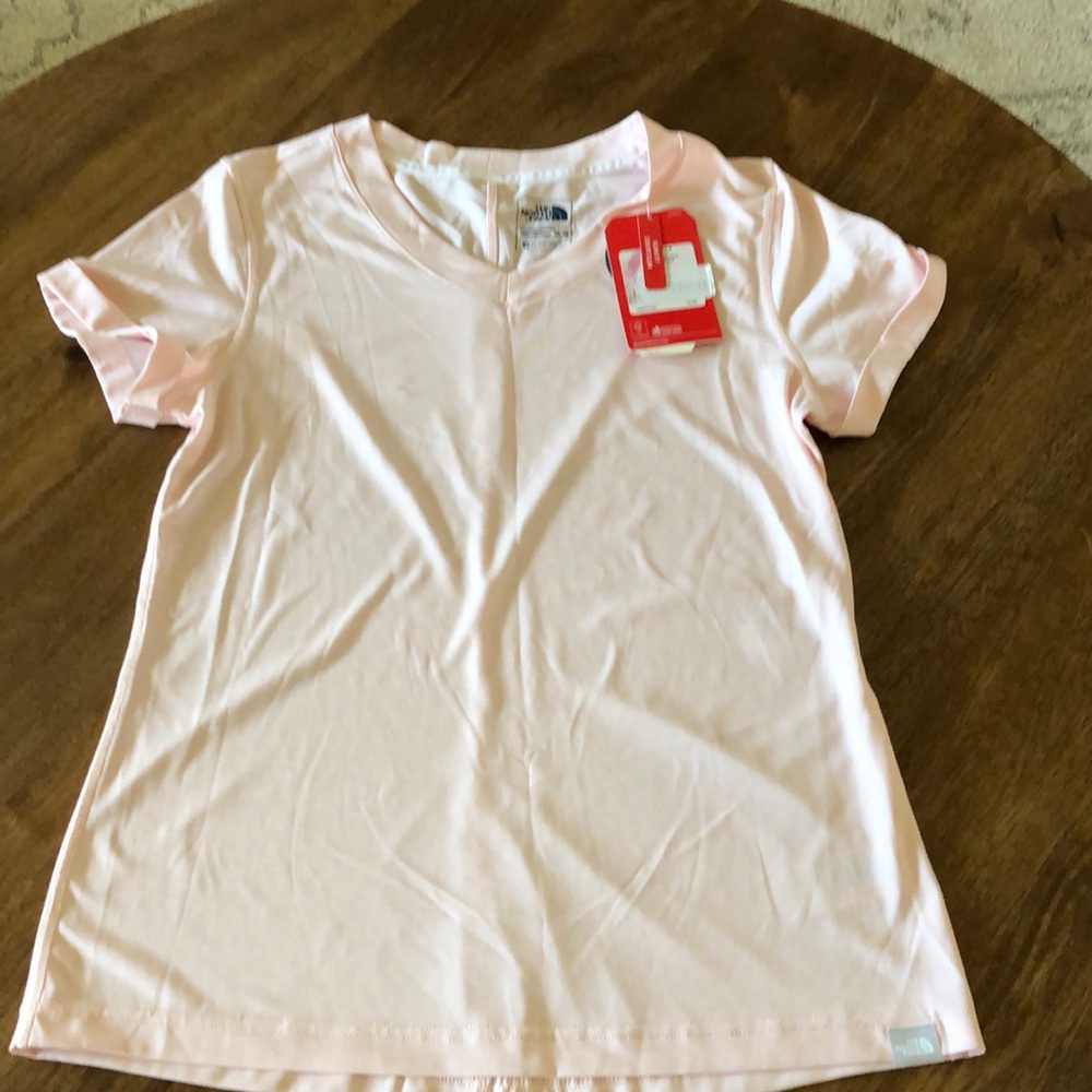 Women’s light pink North Face, dry fit shirt, size Medium